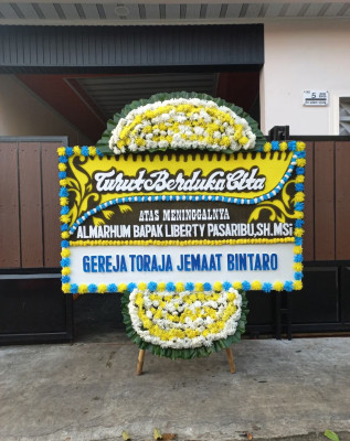 Papan Bunga Duka di Damarraja